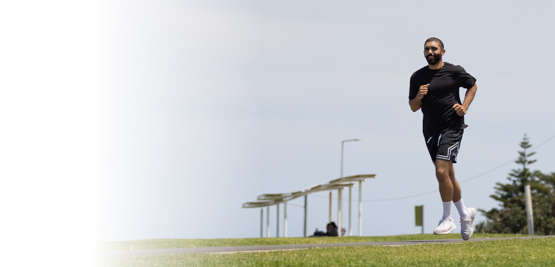 Sportsman running on a jogging track
