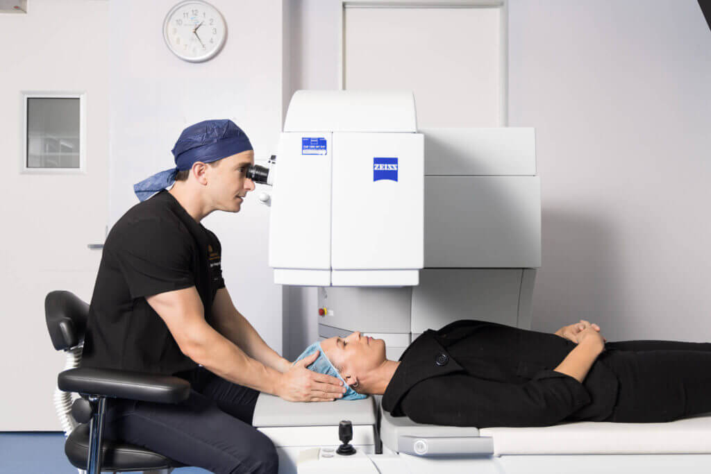 Dr. John Hogden examining patient