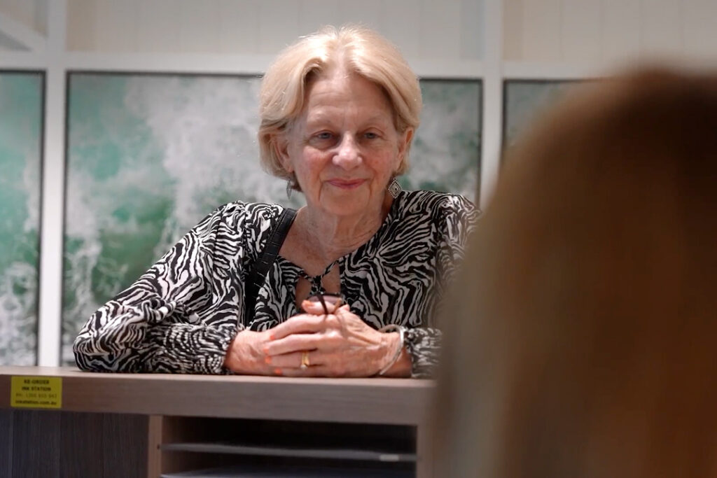 Elder lady at the counter of Lasersight Eye Clinic